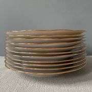 Series of 11 old flat plates in white porcelain and gold edging
