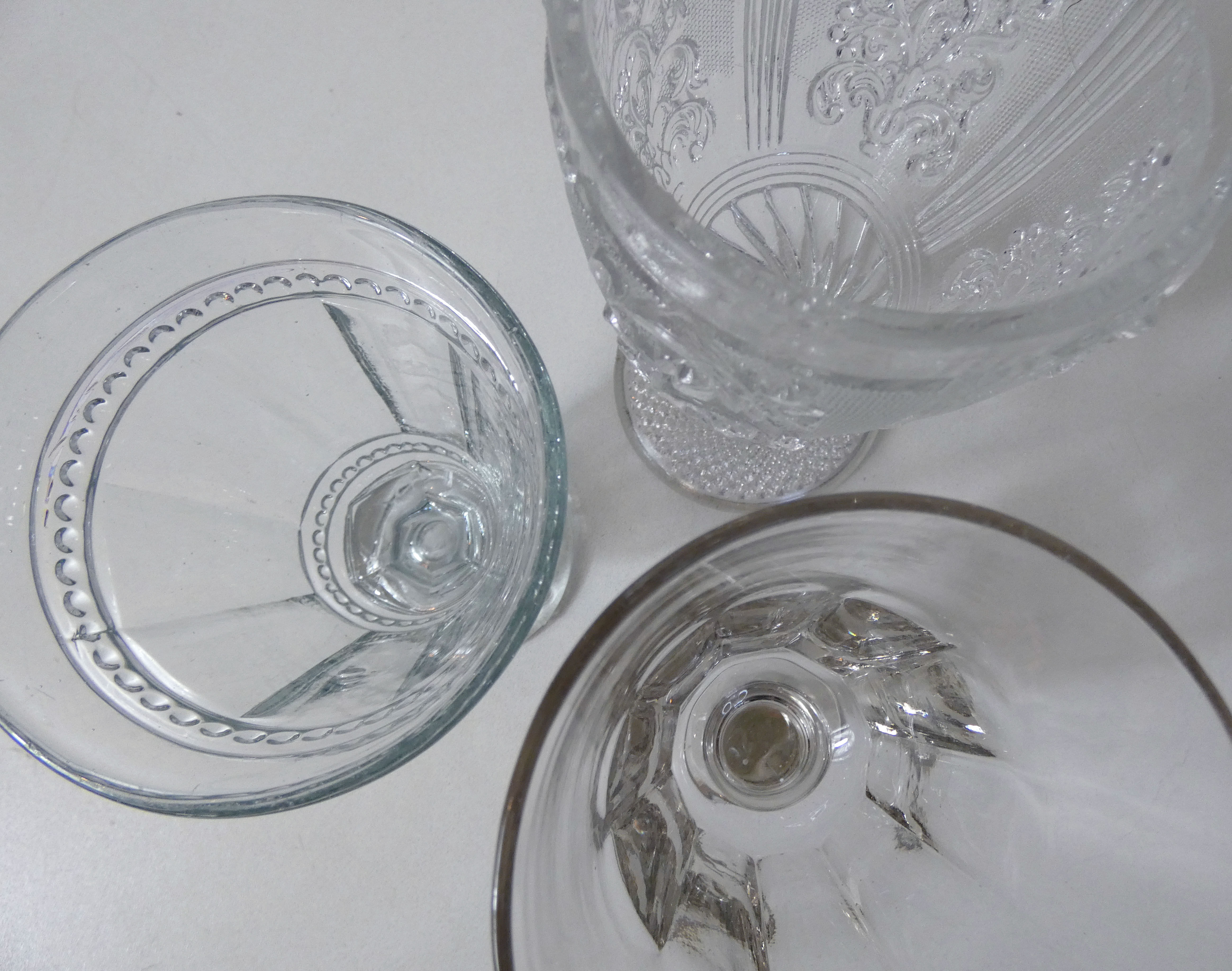 3 old stemmed glasses