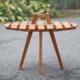 Vintage coffee table, wooden table with central handle, interior decoration, terrace, patio