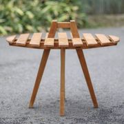 Vintage coffee table, wooden table with central handle, interior decoration, terrace, patio