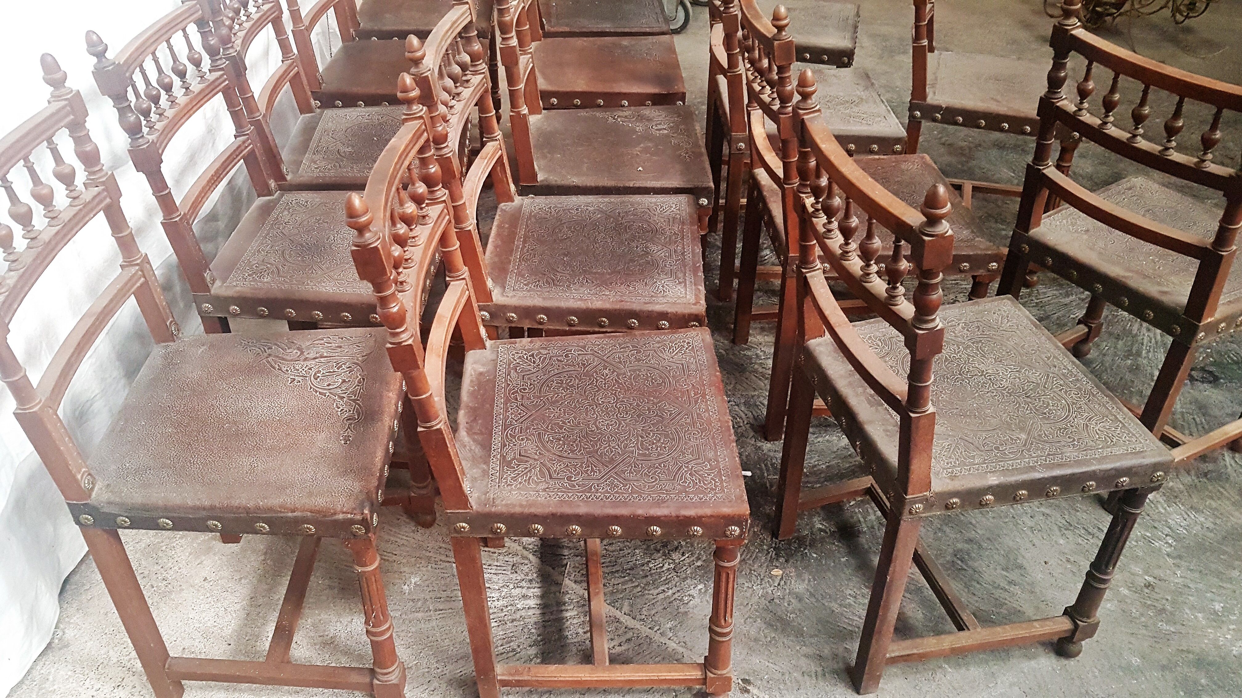A set of 16 henri 2 style chairs in repelled leather 2 patterns