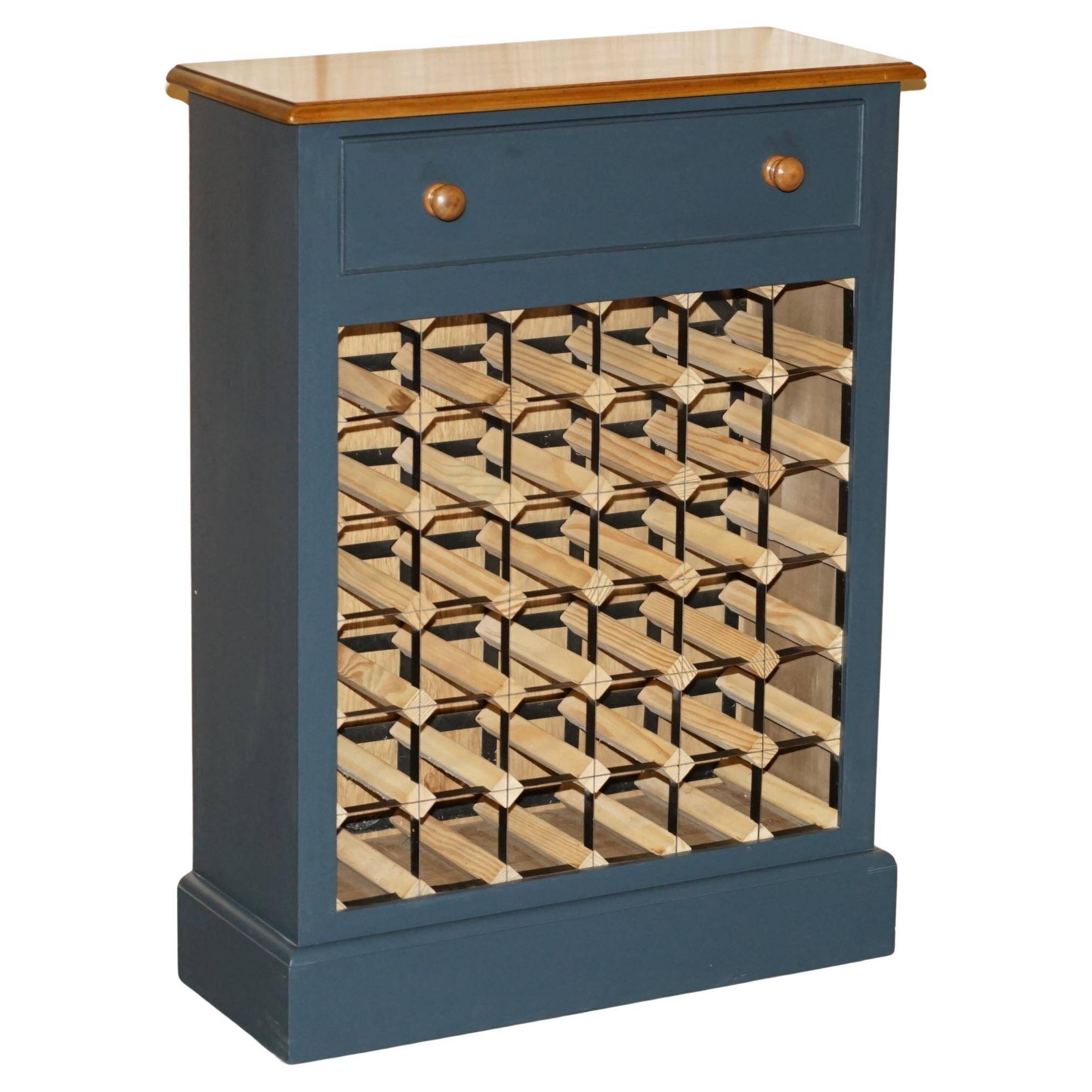 Vintage wine rack furniture for 36 bottles with drawer.