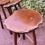 Set of three brutalist tripod stools