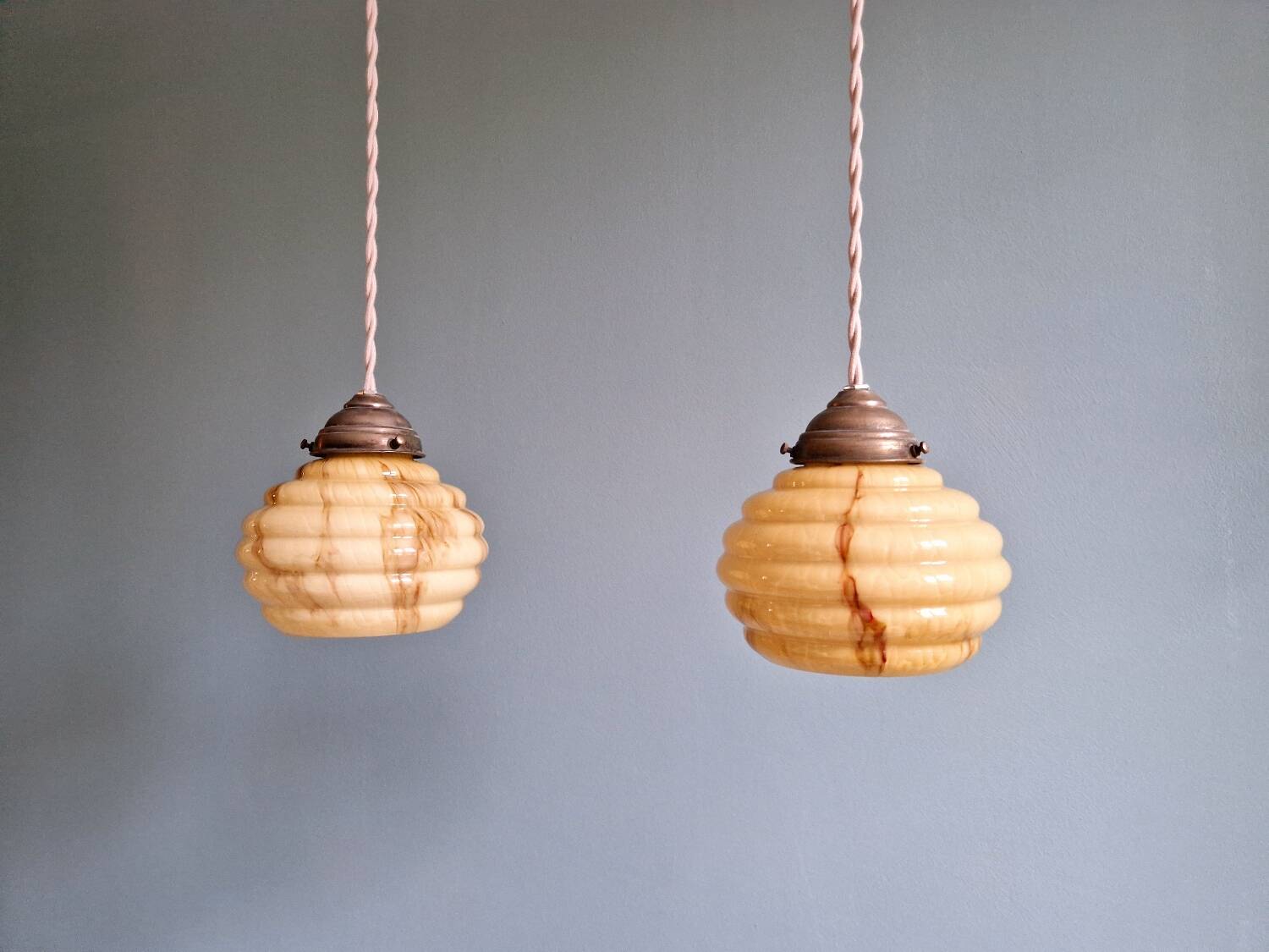 Pair of Art Deco marbled opaline pendant lights, 1920s-30s