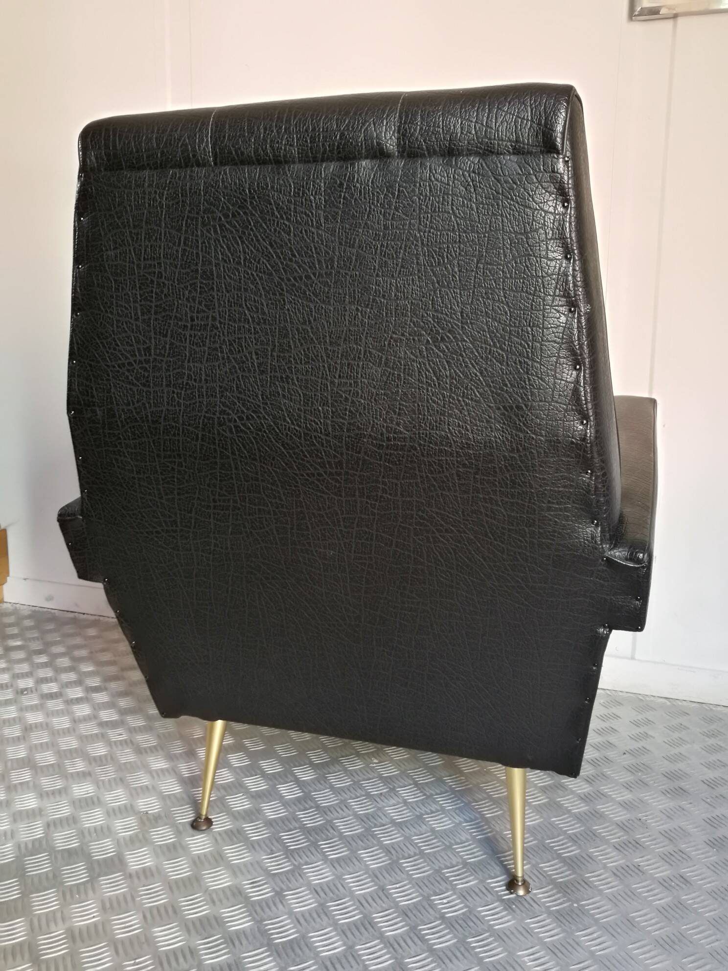 Pair of vintage leather armchairs