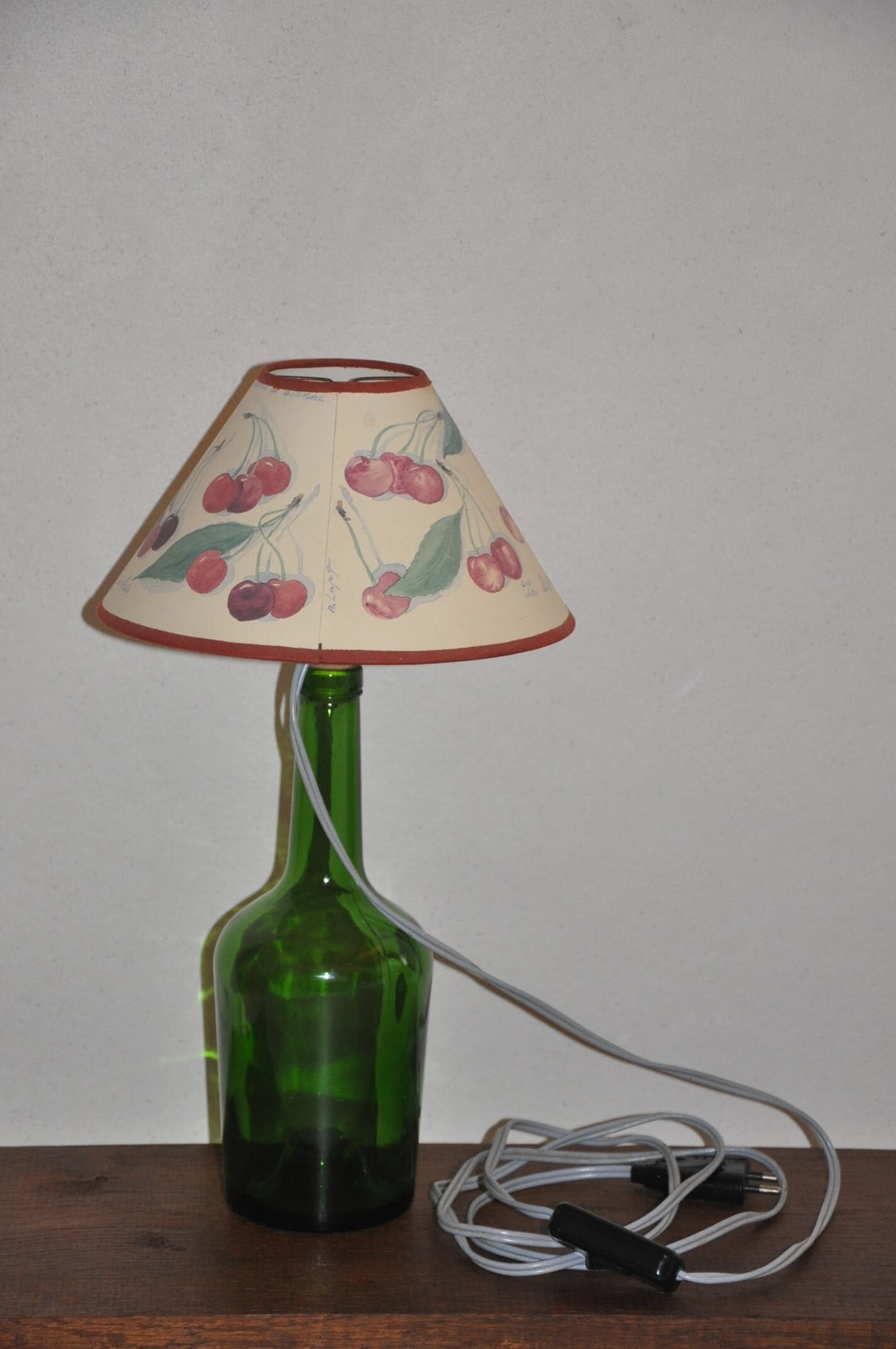 Lampe bouteille en verre vert