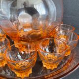 Liquor service in pink moulded glass