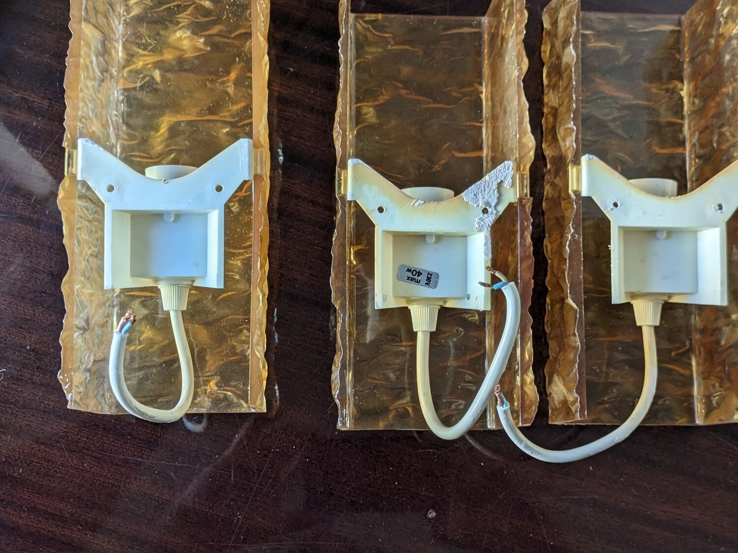 3 champagne-colored resin wall lights 1960 France