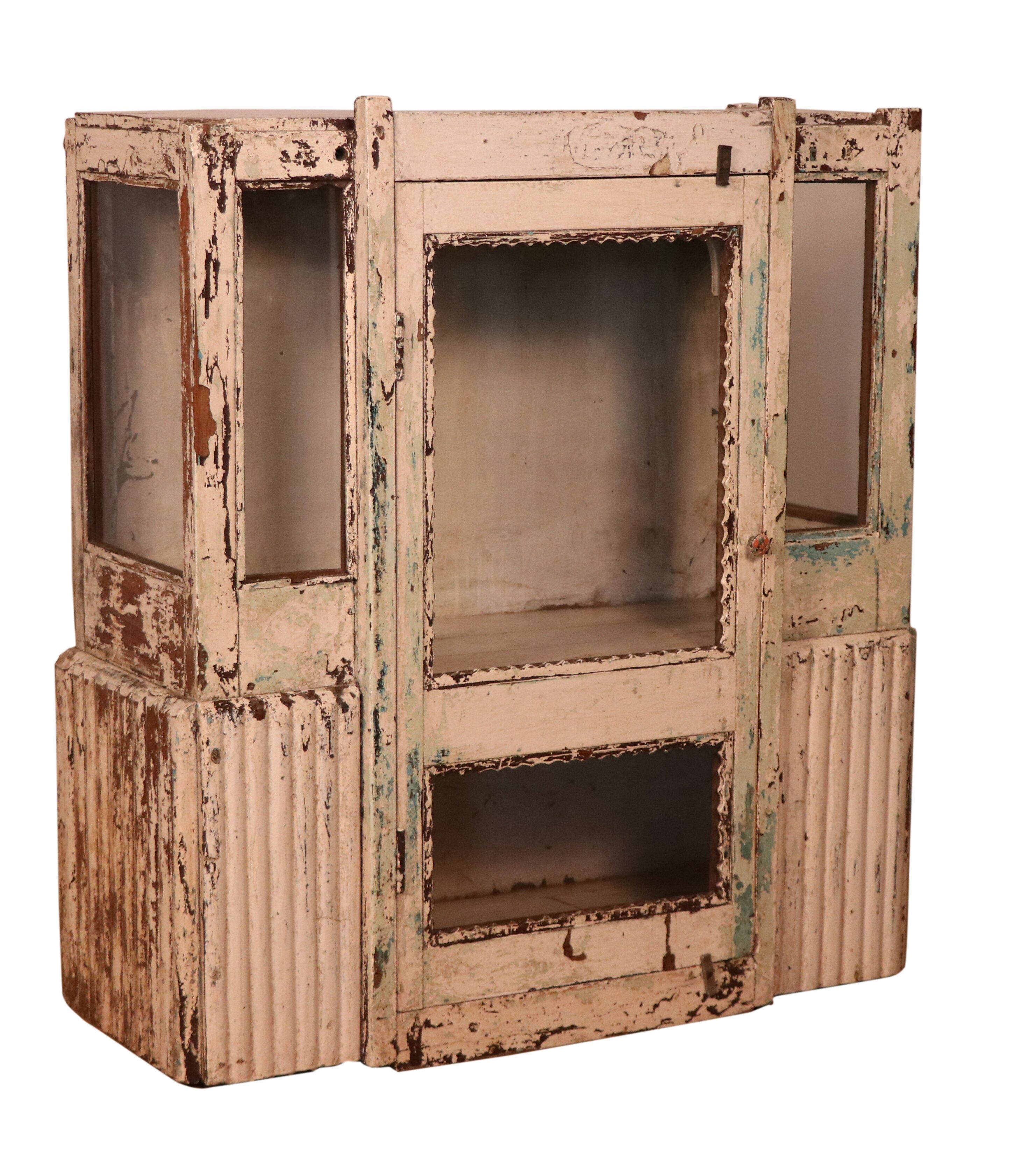 Former art deco cabinet in original burmese teak ecru patina