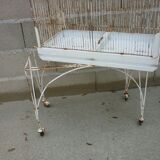 Bird cage with its wheeled holder