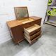 1960s teak sideboard with 4 drawers, 2 doors, and a mirror.
