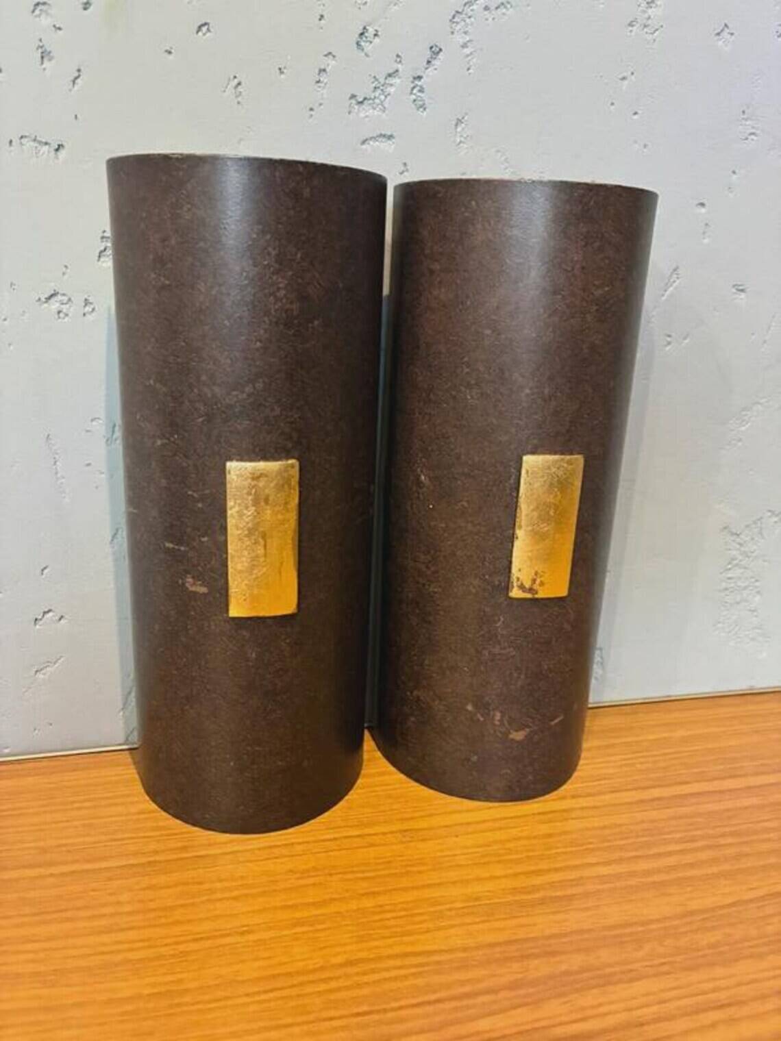 Pair of Menzel Leuchten cylindrical wall lights, brass details, 1990s