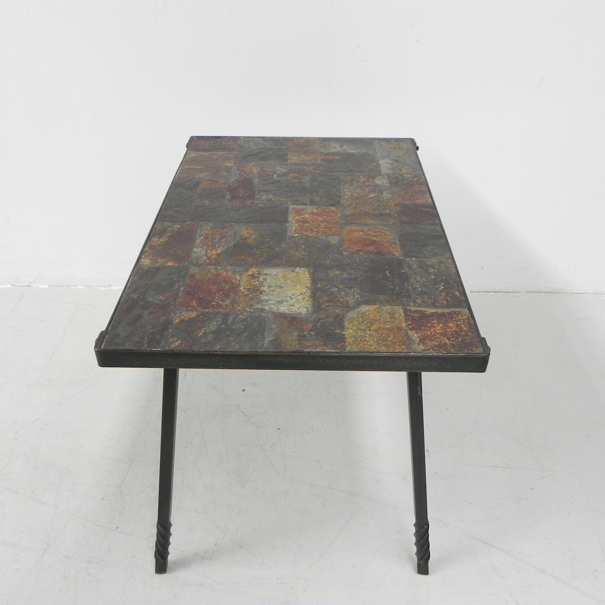 Brutalist coffee table with slate top
