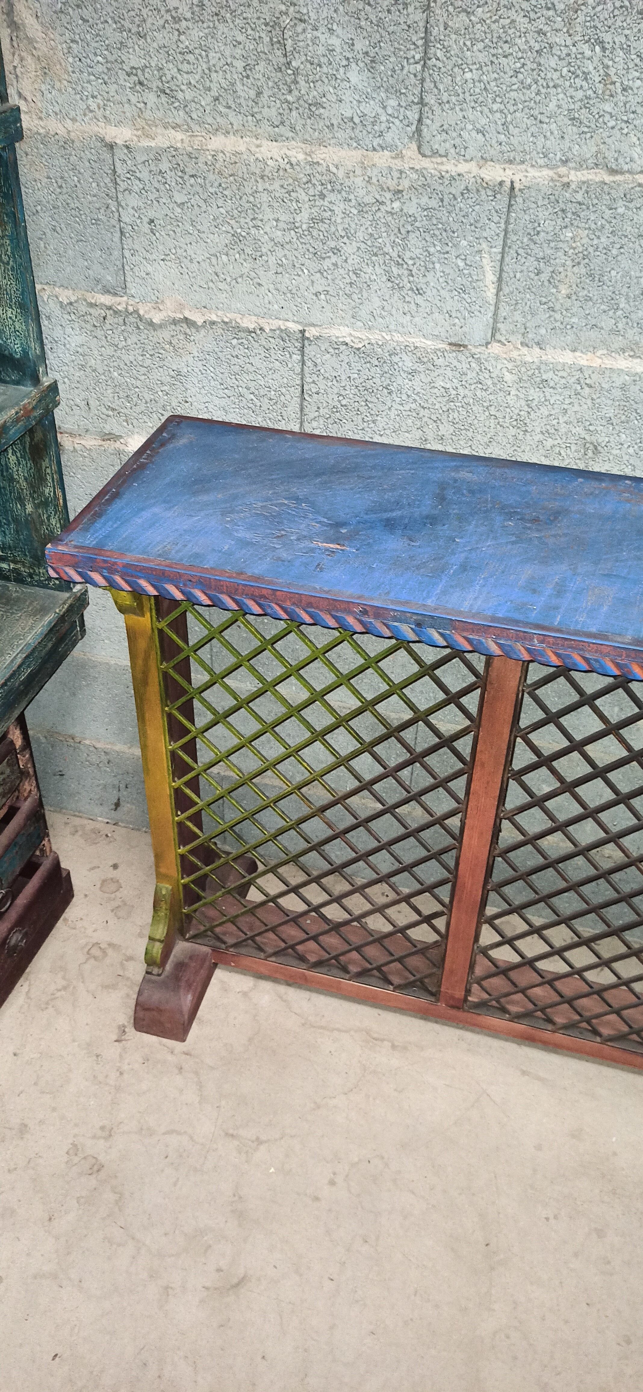 Colorful old standing eat with cast iron grill