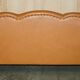 Restored three-seater leather canapé in late Victorian style.