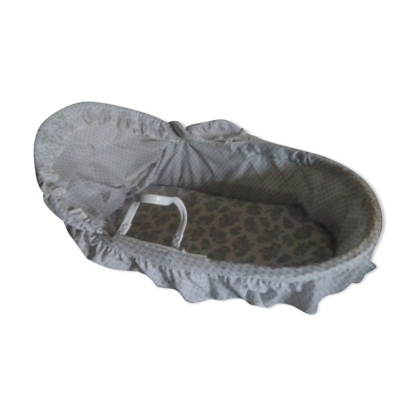 White rattan bassinet