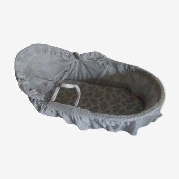 White rattan bassinet