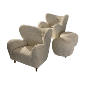 Pair of buckle lounge chairs with footrests