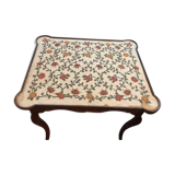 Table with tapestry