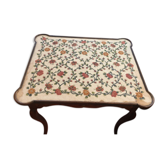 Table with tapestry