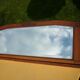 Low mirror in a carved wooden art-deco 1930 112x36cm