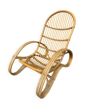 Curved bamboo and rattan armchair in Italian style by Roberti from the 1960s.