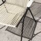 Wrought iron armchair, brass & scoubidou, France 1950s