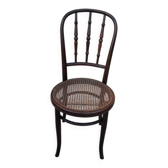 Old caned bistro chair fischel
