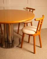 Circular dining table