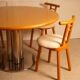 Circular dining table