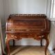 Louis XV cylinder desk with marquetry and bronze.