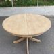 Renovated Scandinavian dining table in solid oak with a central leg from the 1970s.