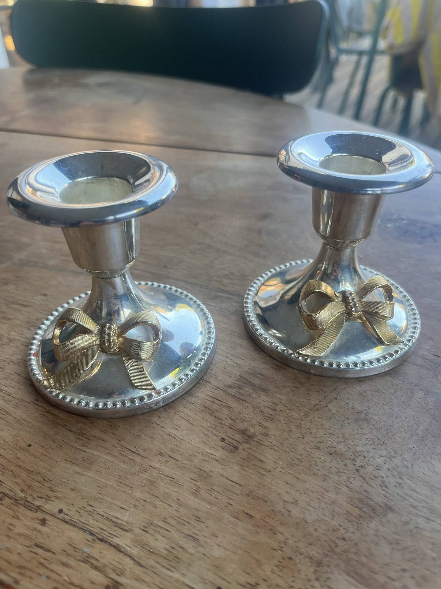 2 silver-plated candlesticks