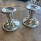 2 silver-plated candlesticks