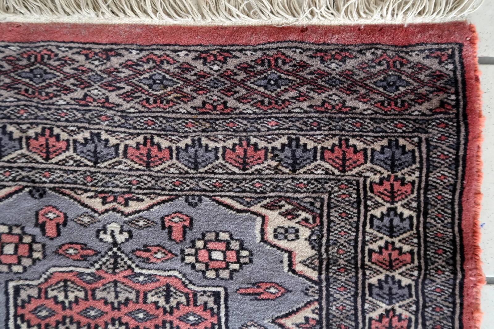 Handmade vintage Uzbek Bukhara rug 64cm x 94cm 1950s