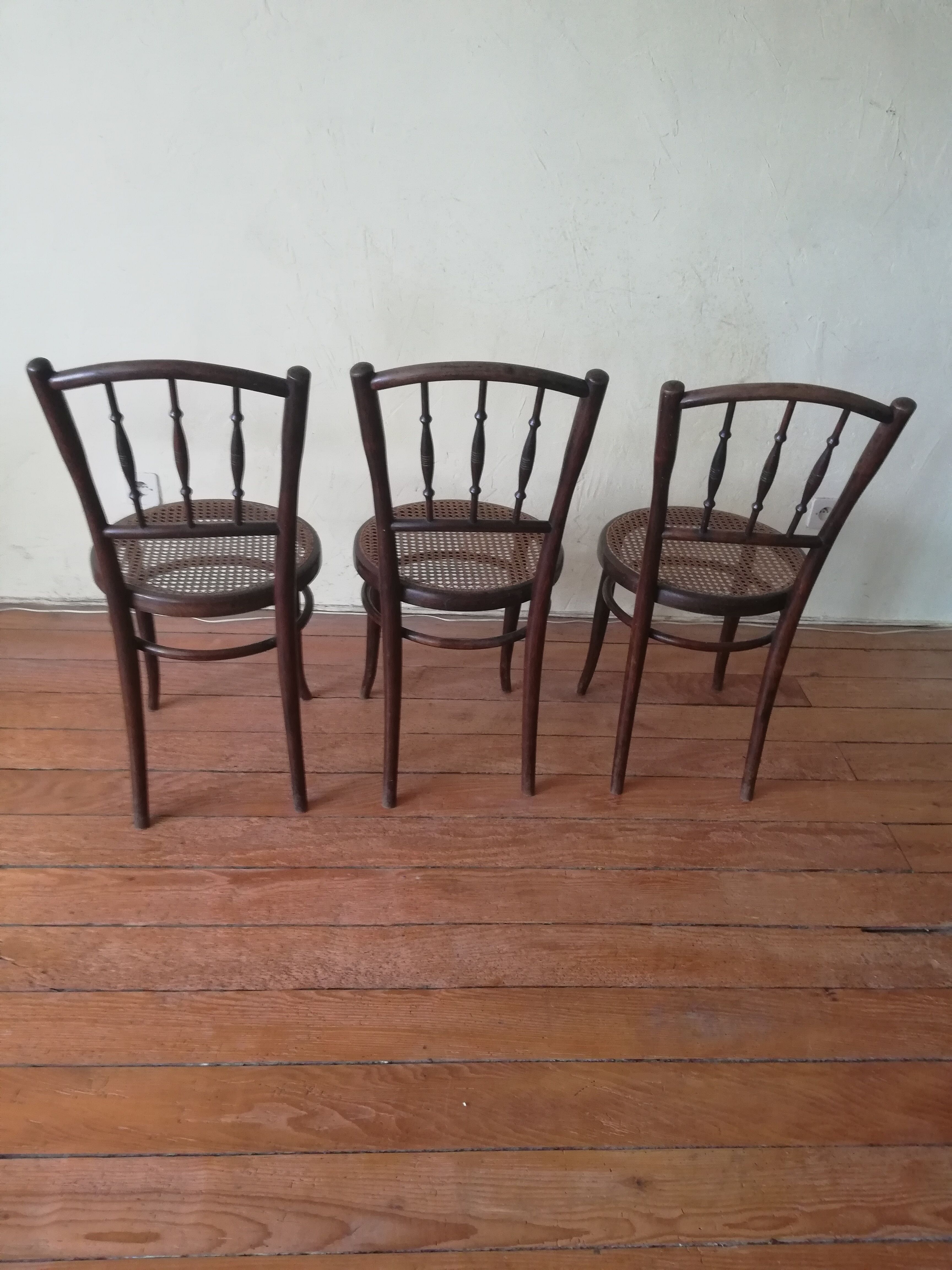 Old curved wooden bistro chairs