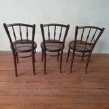 Old curved wooden bistro chairs