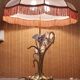 Large gilded brass lamp with white porcelain fleur-de-lis decoration