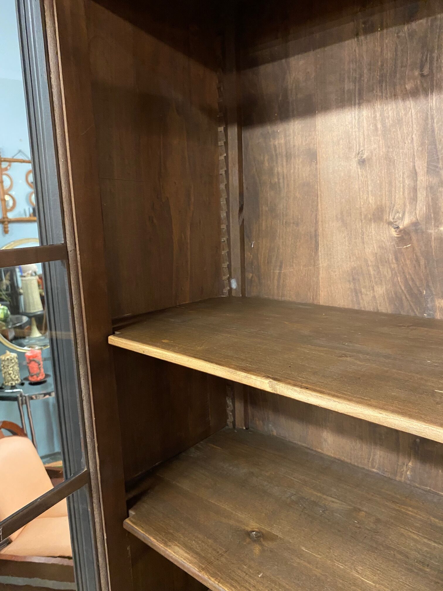 Black bookcase with glass doors