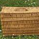vintage hand-woven wicker storage basket or suitcase