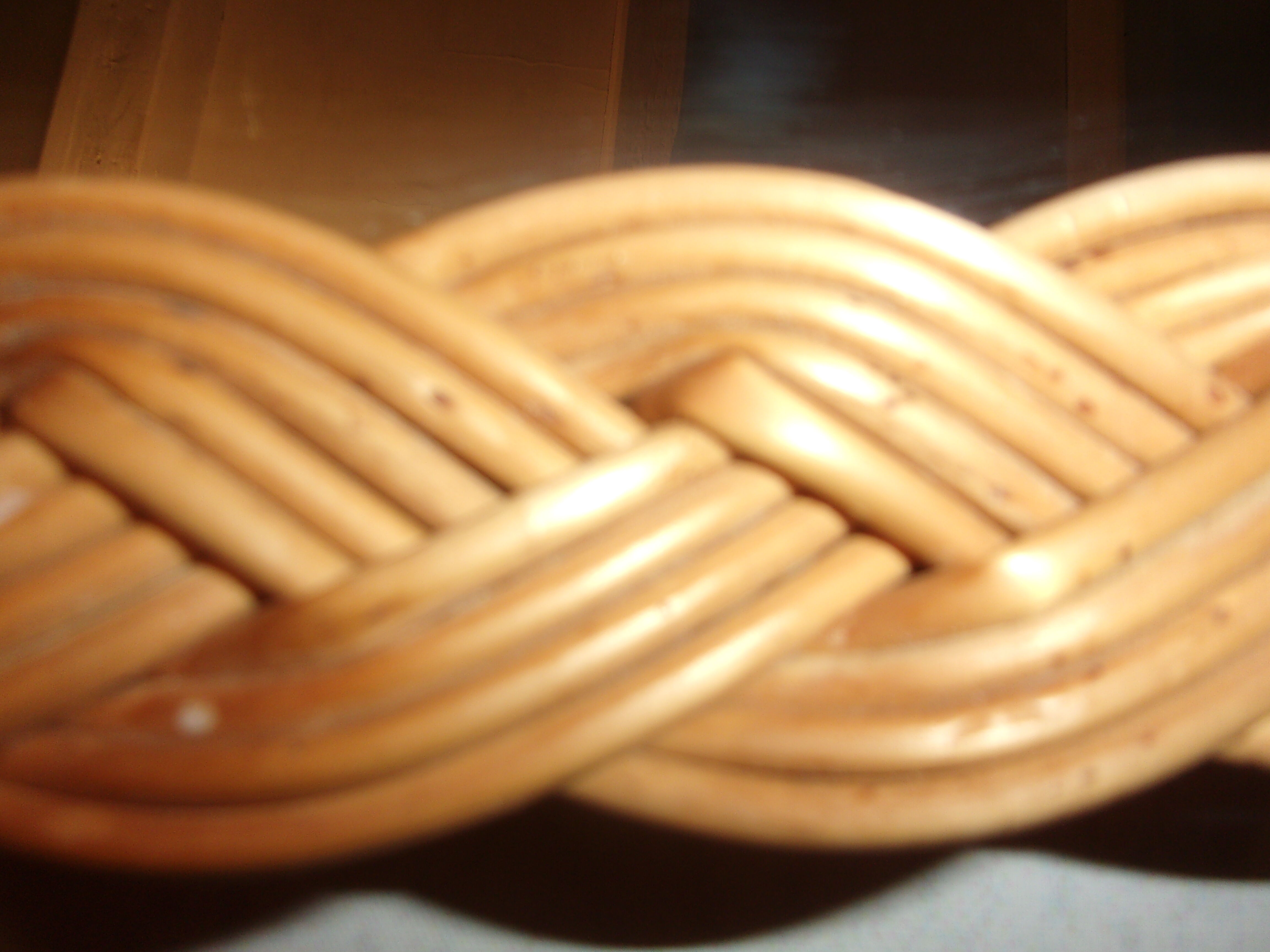 Oval-style rattan mirror