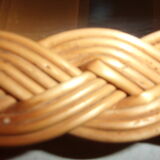 Oval-style rattan mirror