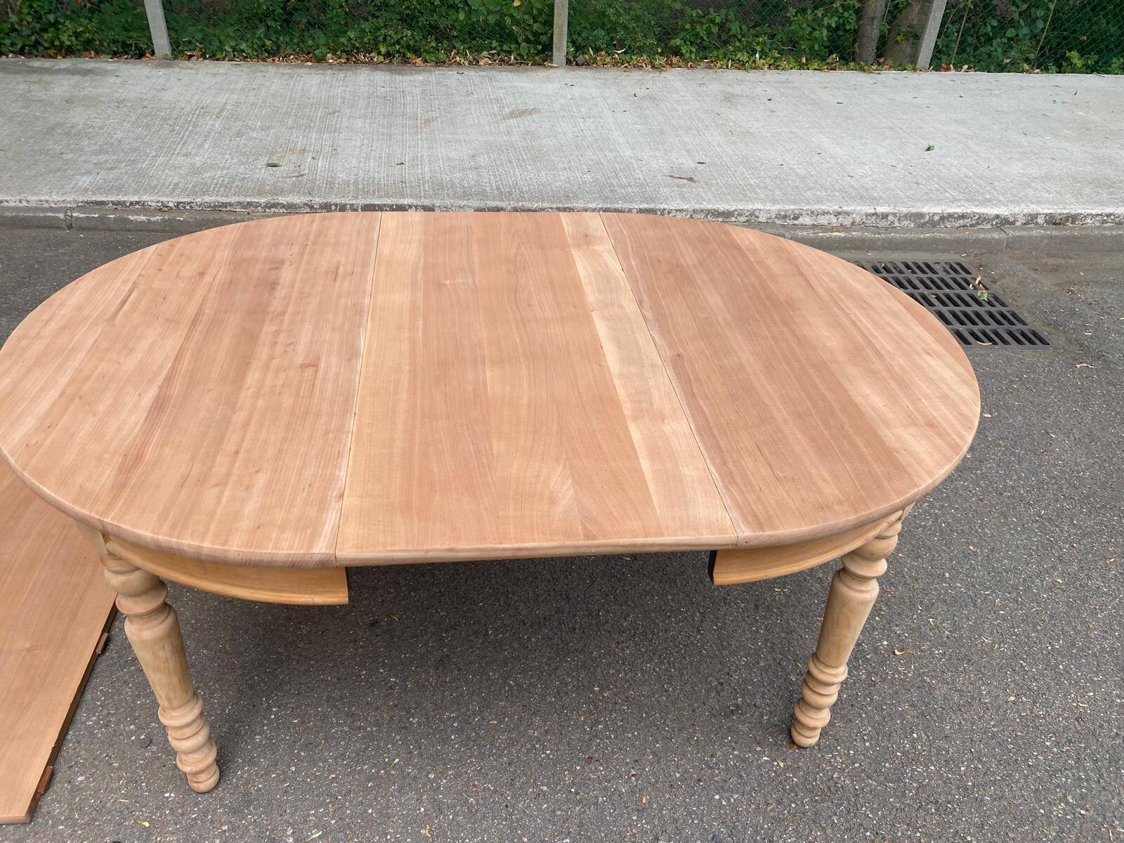Round extendable dining table stripped in solid cherry wood France 1950