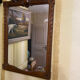 Carved wooden mirror in Louis XVI style