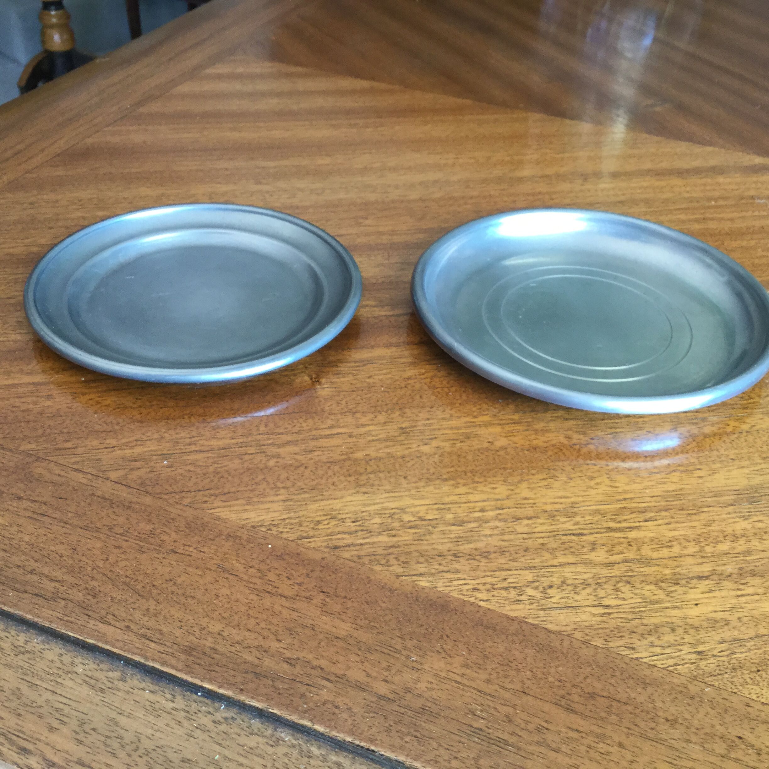 Bottle mats punched tin