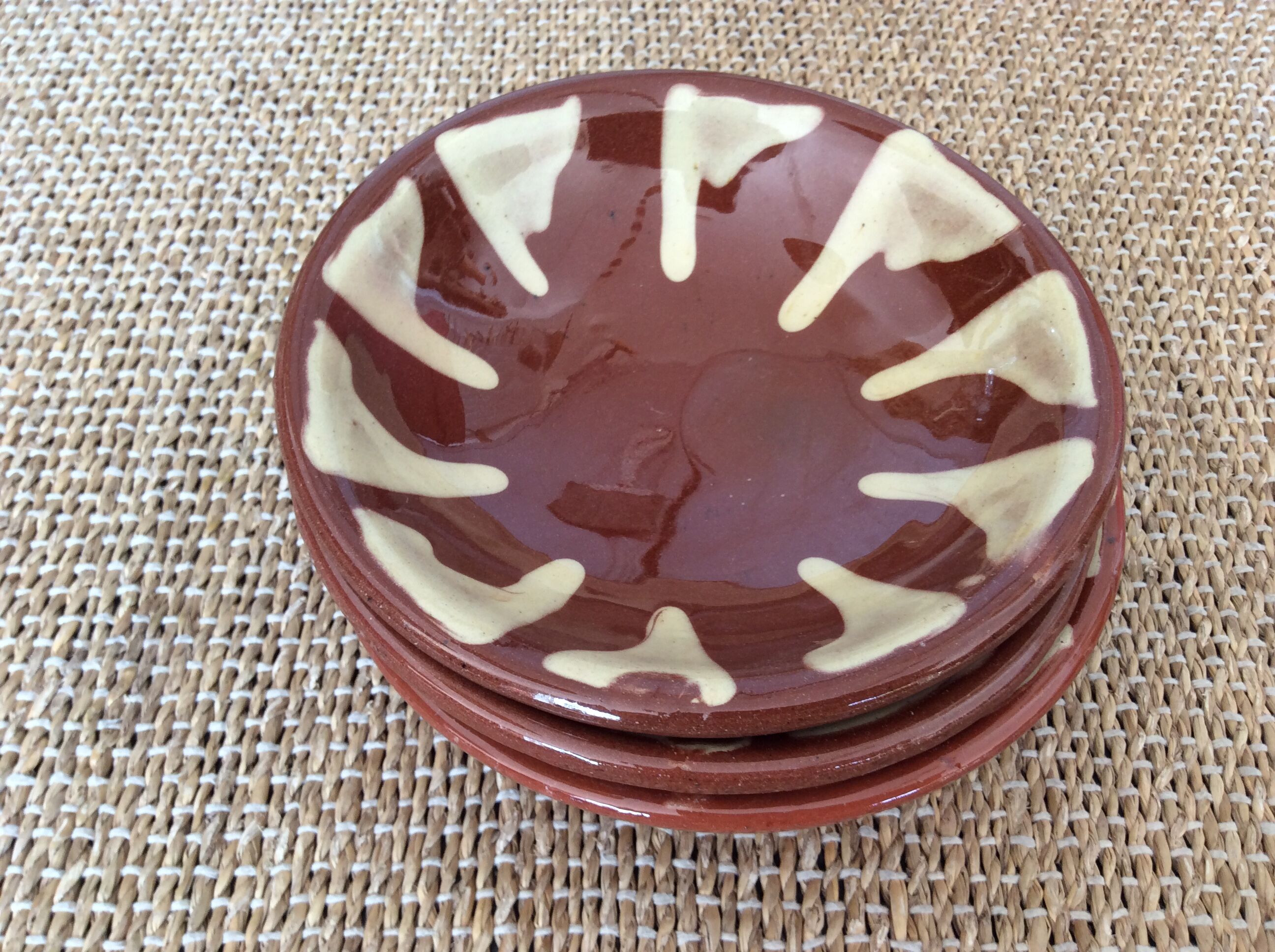 3 glazed terracotta plates