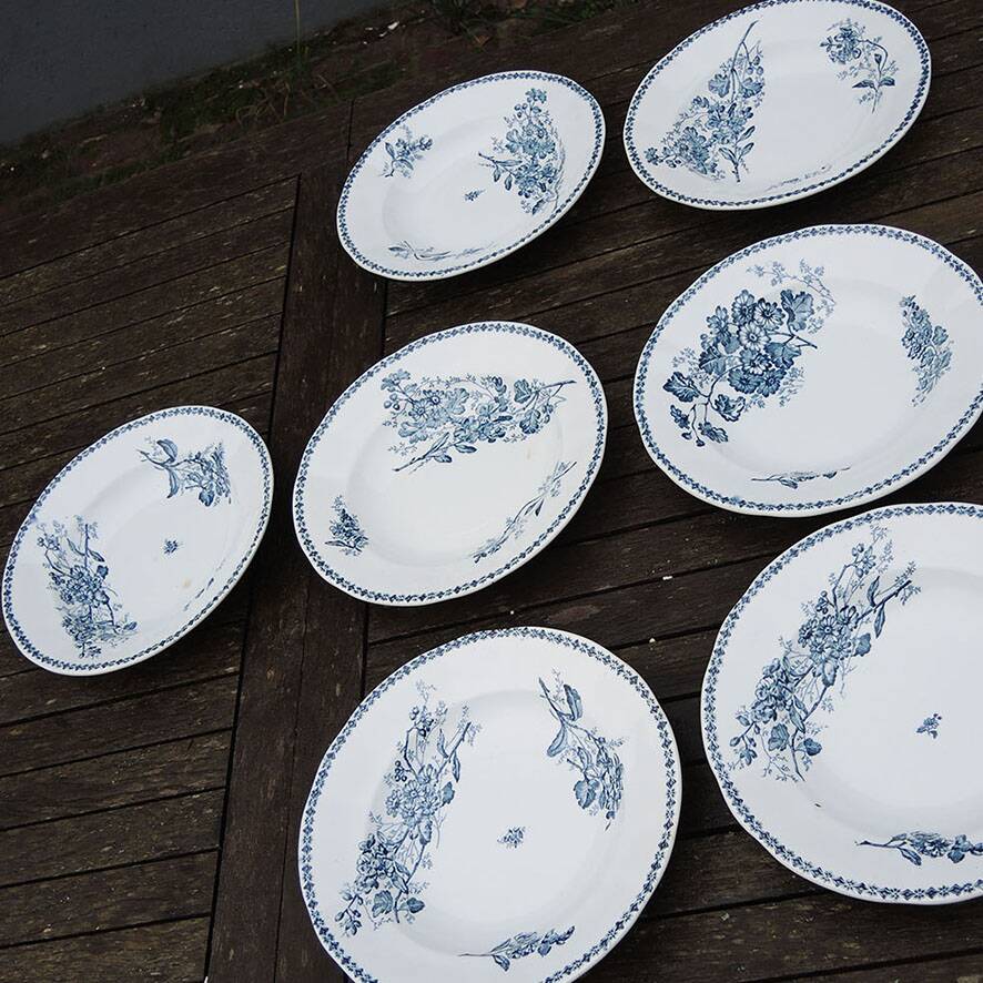 10 old deep plates made of ironstone with floral decoration