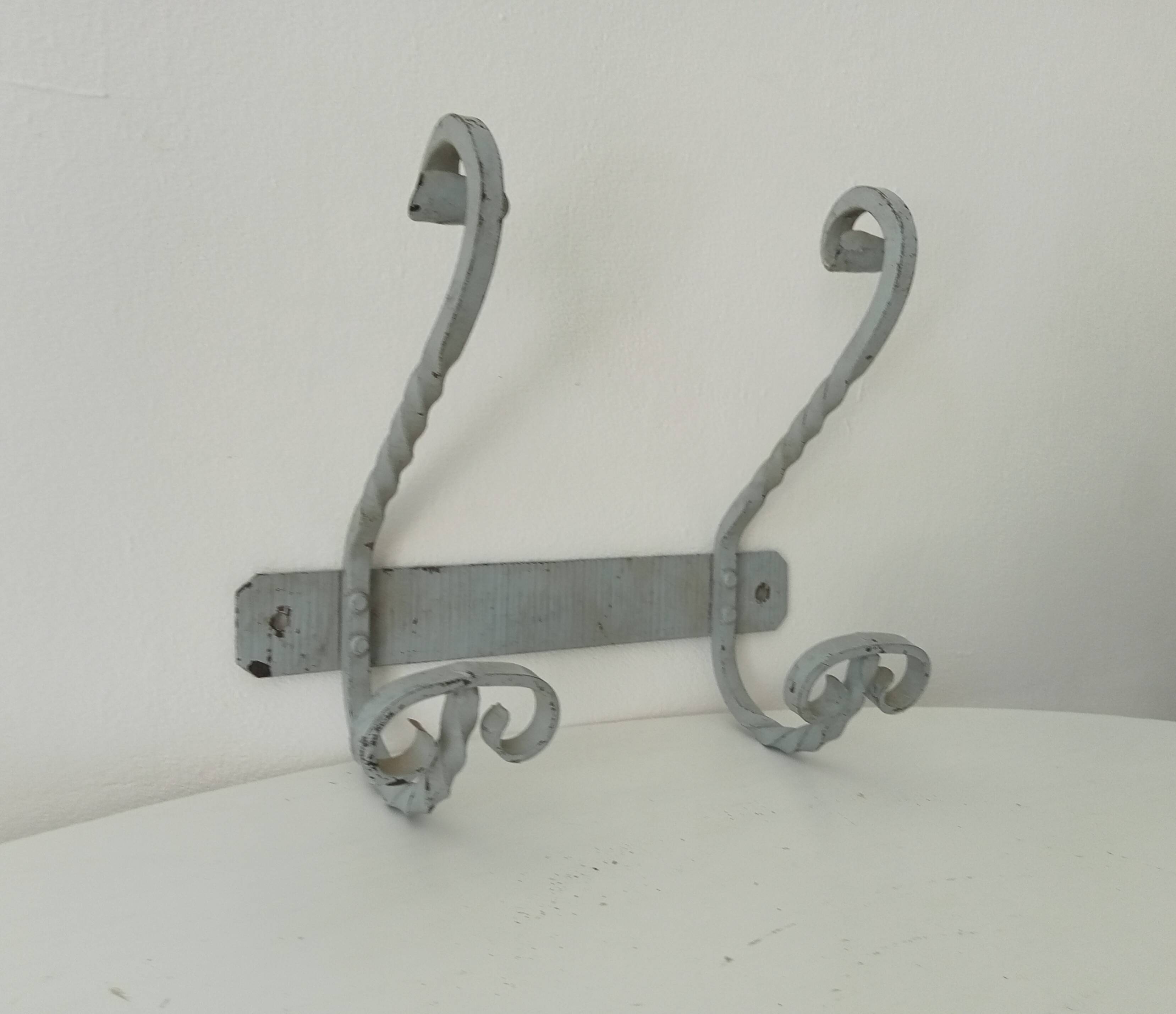 Vintage wrought iron wall coat rack
