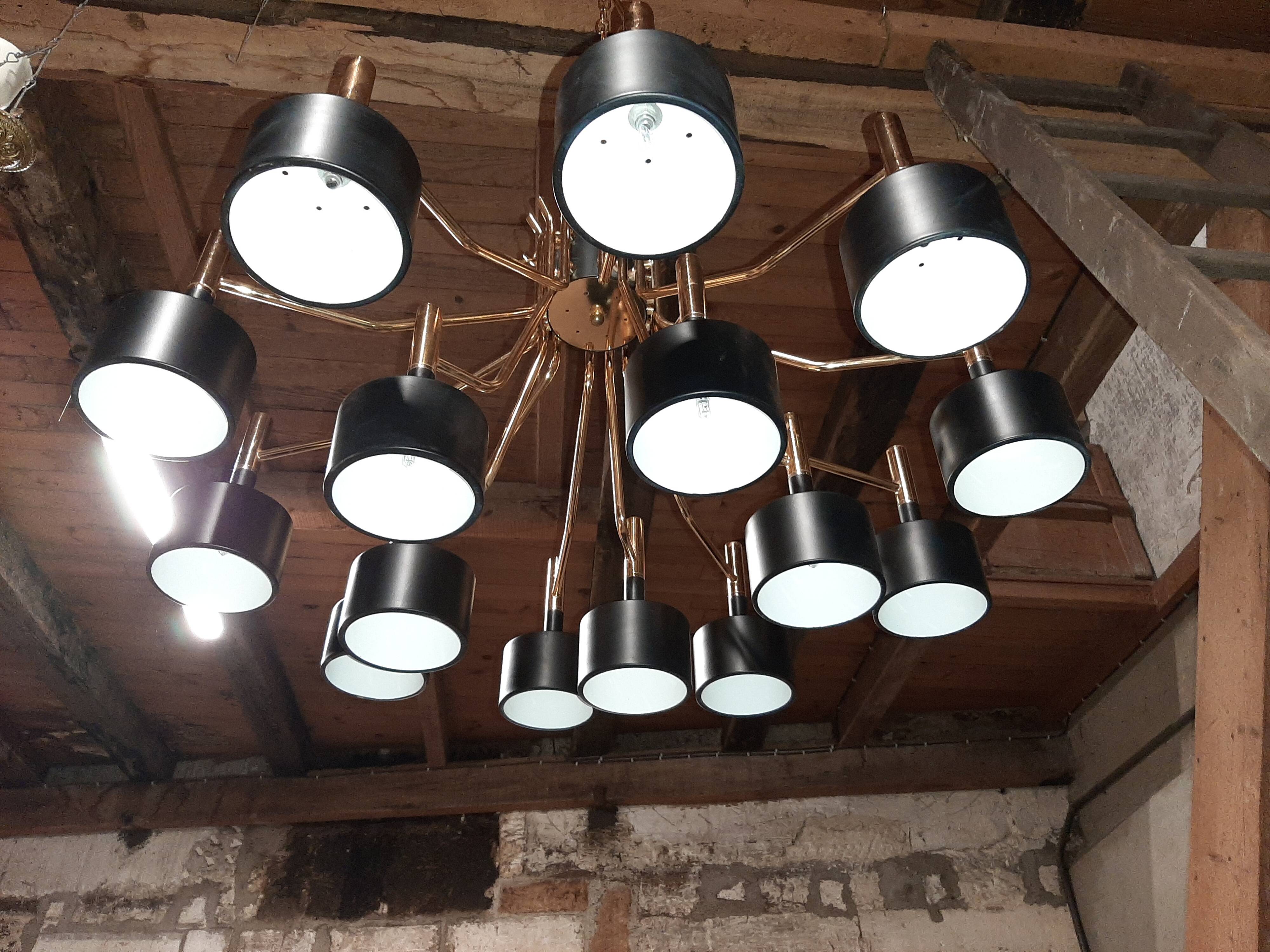 Black chandelier and gilded metal