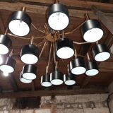 Black chandelier and gilded metal